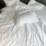 white pillows and bed linen
