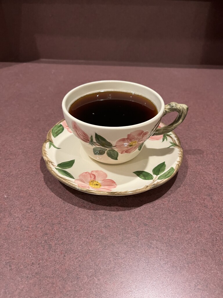cup and saucer with coffee