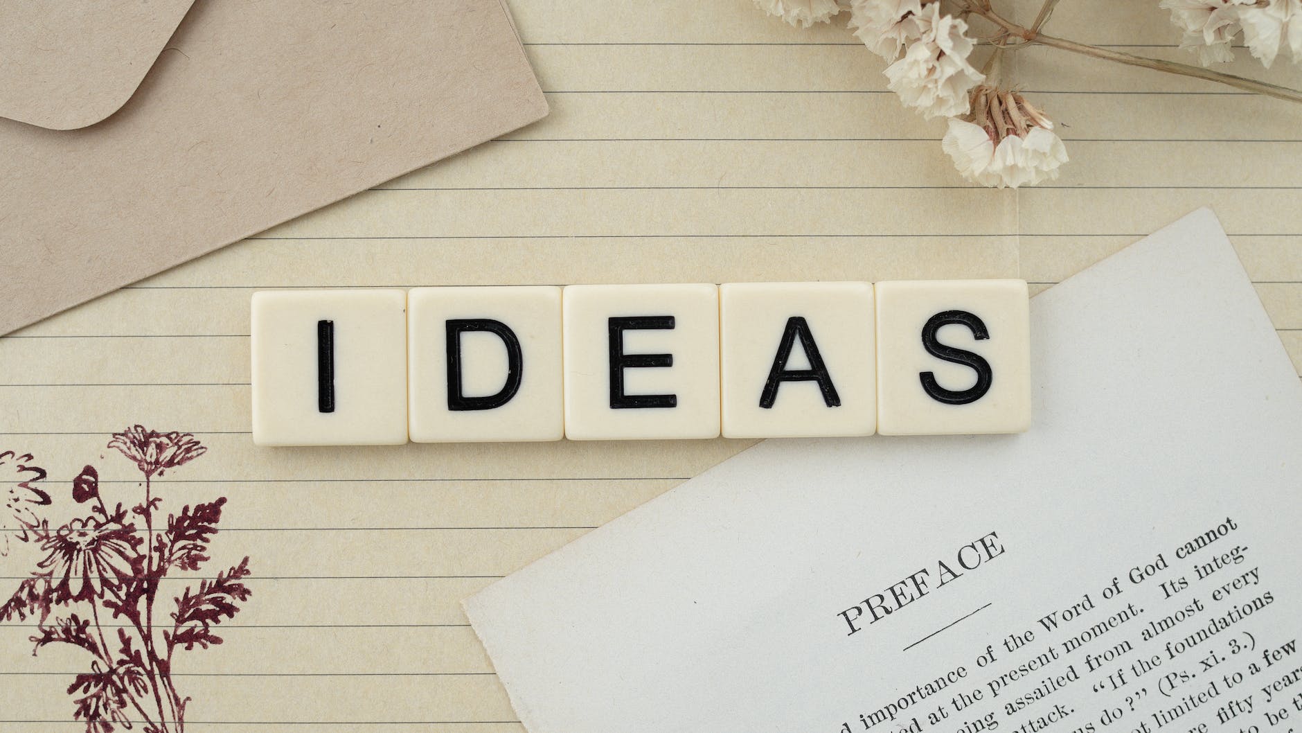 the word ideas spelled in letter tiles