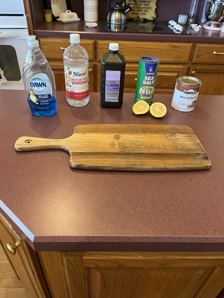 supplies for cleaning an old cutting board