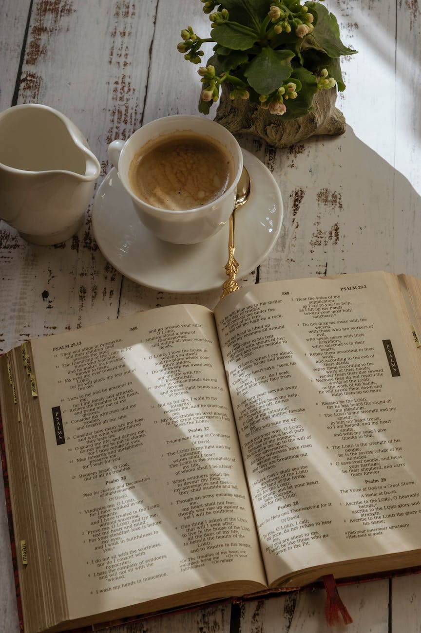 a bible and a cup of coffee with life applications