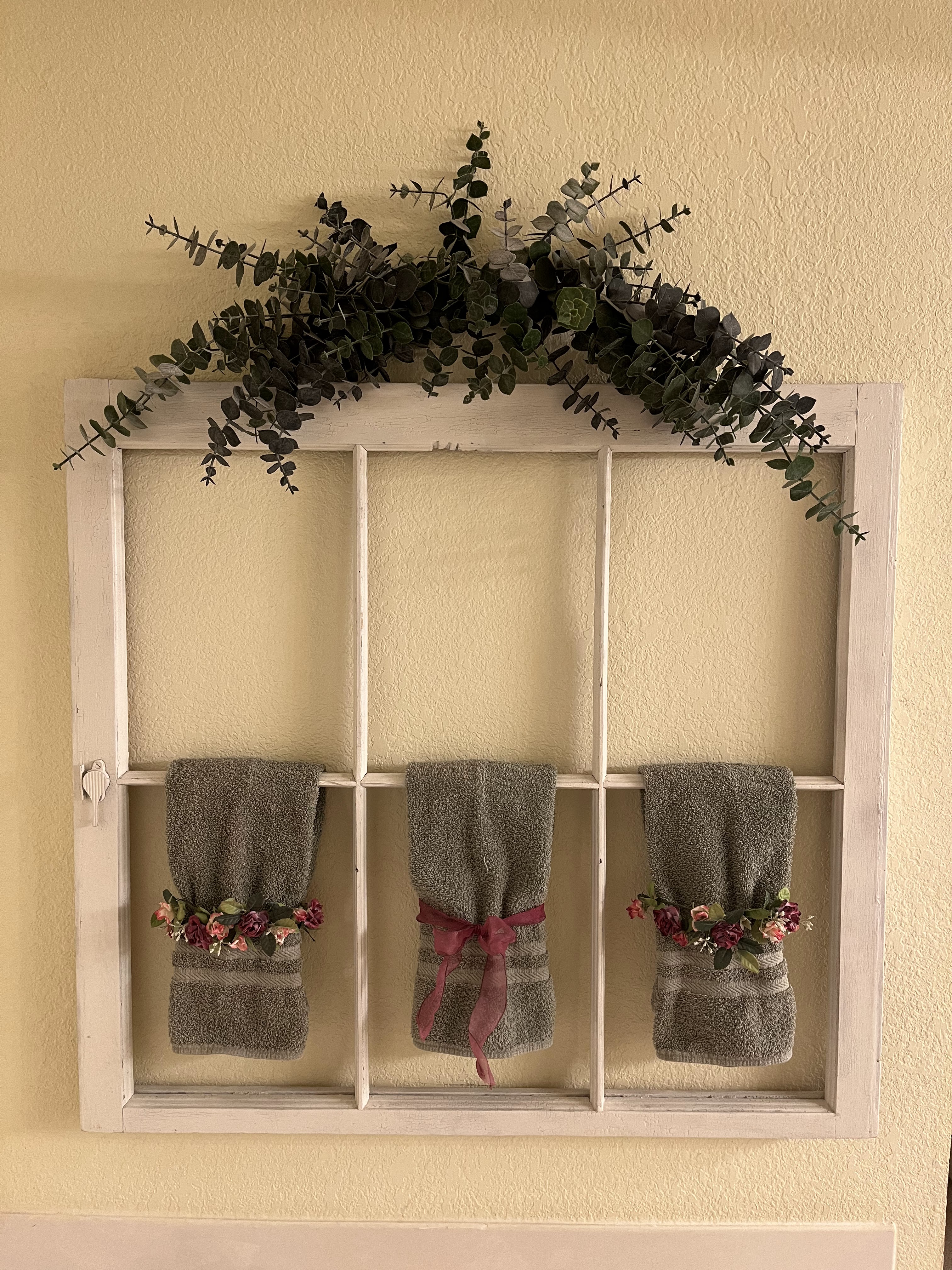 old window transformed into a new towel rack