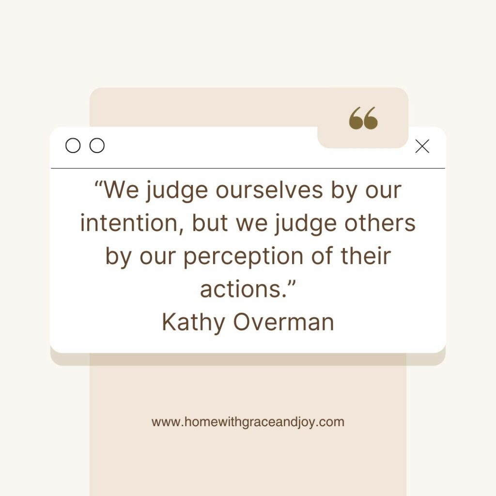 An inspirational quote on a minimalist beige background reads, "We judge ourselves by our intention, but we judge others by our perception of their actions." - Kathy Overman. Below the quote, the website www.homewithgraceandjoy.com is displayed, offering life applications for better living.